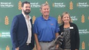 Patrick Dodds, left, the executive director of Bread of the Mighty, stands with former University of Football head coach and quarterback Steve Spurrier, center, and Susan King, the CEO of Feeding Northeast Florida, during the 2023 Empty Bowls luncheon fundraiser.