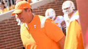 Tennessee football coach Josh Heupel enters the field for the start of the Orange & White spring game, in Neyland Stadium, Saturday, April 15, 2023
