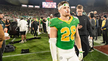 Oregon inside linebacker Bryce Boettcher walks off the field as the Oregon Ducks face the Ohio State Buckeyes Wednesday, Jan. 1, 2025, in the quarterfinal of the College Football Playoff at the Rose Bowl in Pasadena, Calif.