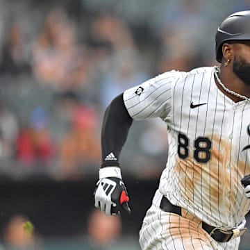 Jul 30, 2025; Chicago, Illinois, USA; Chicago White Sox center fielder Luis Robert Jr. (88) runs to first base hitting a single during the sixth inning against the Philadelphia Phillies at Rate Field. Mandatory Credit: Patrick Gorski-Imagn Images