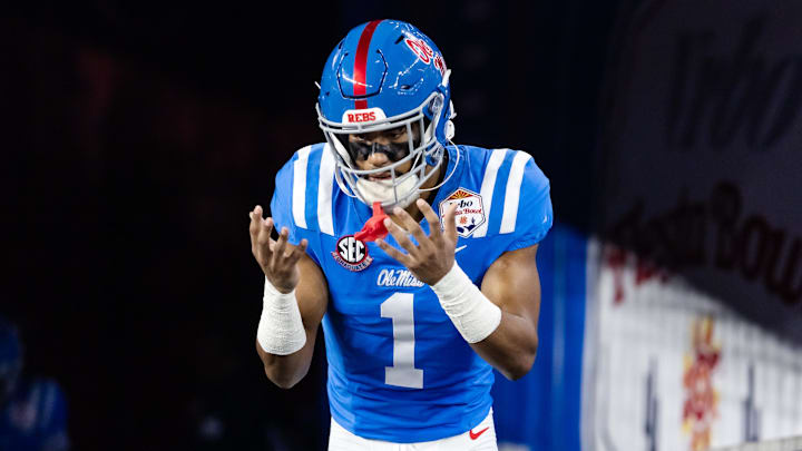 Jan 8, 2026; Glendale, AZ, USA; Mississippi Rebels wide receiver De'Zhaun Stribling (1) against the Miami Hurricanes during the 2026 Fiesta Bowl and semifinal game of the College Football Playoff at State Farm Stadium. Mandatory Credit: Mark J. Rebilas-Imagn Images