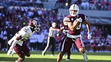Oct 19, 2024; Starkville, Mississippi, USA; Mississippi State Bulldogs tight end Seydou Traore (18) runs the ball after a reception against Texas A&M Aggies defensive back Dalton Brooks (25) during the second quarter at Davis Wade Stadium at Scott Field. Mandatory Credit: Matt Bush-Imagn Images