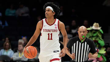 Mar 12, 2025; Charlotte, NC, USA; Stanford Cardinal guard Ryan Agarwal (11) brings the ball up the court in the first half at Spectrum Center. Mandatory Credit: Bob Donnan-Imagn Images