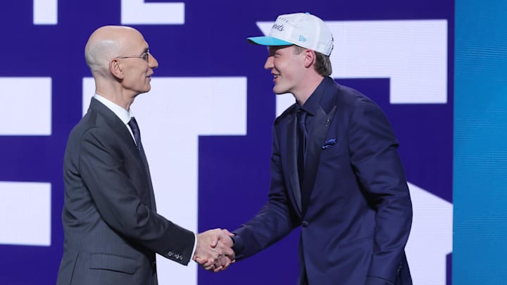 Kon Knueppel shakes hands with NBA commissioner Adam Silver