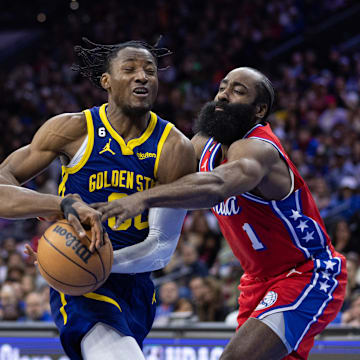 Dec 16, 2022; Philadelphia, Pennsylvania, USA; Philadelphia 76ers guard James Harden (1) and guard Shake Milton (18) steal the ball from Golden State Warriors forward Jonathan Kuminga (00) during the second quarter at Wells Fargo Center. Mandatory Credit: Bill Streicher-Imagn Images