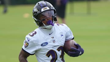 Jul 24, 2025; Owings Mills, MD, USA; Former Baltimore Ravens cornerback Jaire Alexander (23) runs drills during training camp at the Under Armour Performance Center.