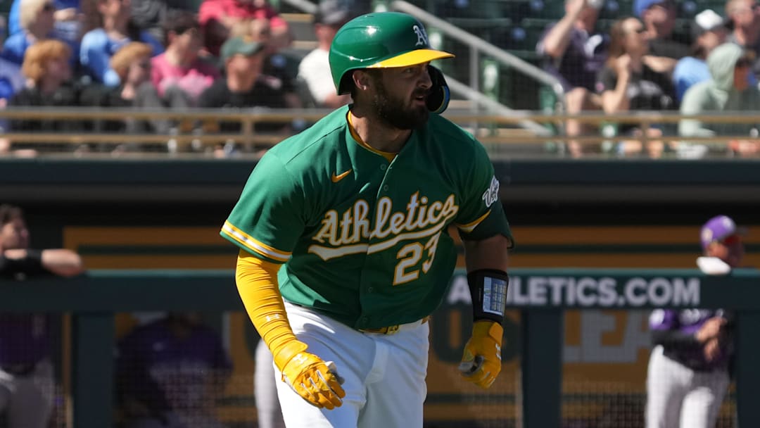 Mar 6, 2026; Mesa, Arizona, USA; Athletics catcher Shea Langeliers (23) hits a double against the Colorado Rockies in the first inning at Hohokam Stadium. Mandatory Credit: Rick Scuteri-Imagn Images Mar 6, 2026; Mesa, Arizona, USA; Athletics catcher Shea Langeliers (23) hits a double against the Colorado Rockies in the first inning at Hohokam Stadium. Mandatory Credit: Rick Scuteri-Imagn Images
