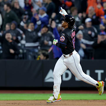 May 9, 2025; New York City, New York, USA; New York Mets shortstop Francisco Lindor (12) reacts as he rounds the bases after hitting a solo home run against the Chicago Cubs during the first inning at Citi Field. Mandatory Credit: Brad Penner-Imagn Images