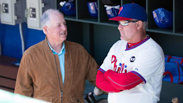 May 14, 2015; Philadelphia, PA, USA; Philadelphia Phillies interim chief executive officer Pat Gillick talks with manager Ryne Sandberg (23) prior to a game against the Pittsburgh Pirates at Citizens Bank Park. The Phillies won 4-2. Mandatory Credit: Bill Streicher-Imagn Images