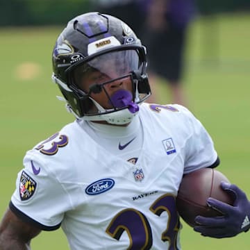 Jul 24, 2025; Owings Mills, MD, USA; Baltimore Ravens cornerback Jaire Alexander (23) runs drills during training camp at the Under Armour Performance Center. Mandatory Credit: Mitch Stringer-Imagn Images