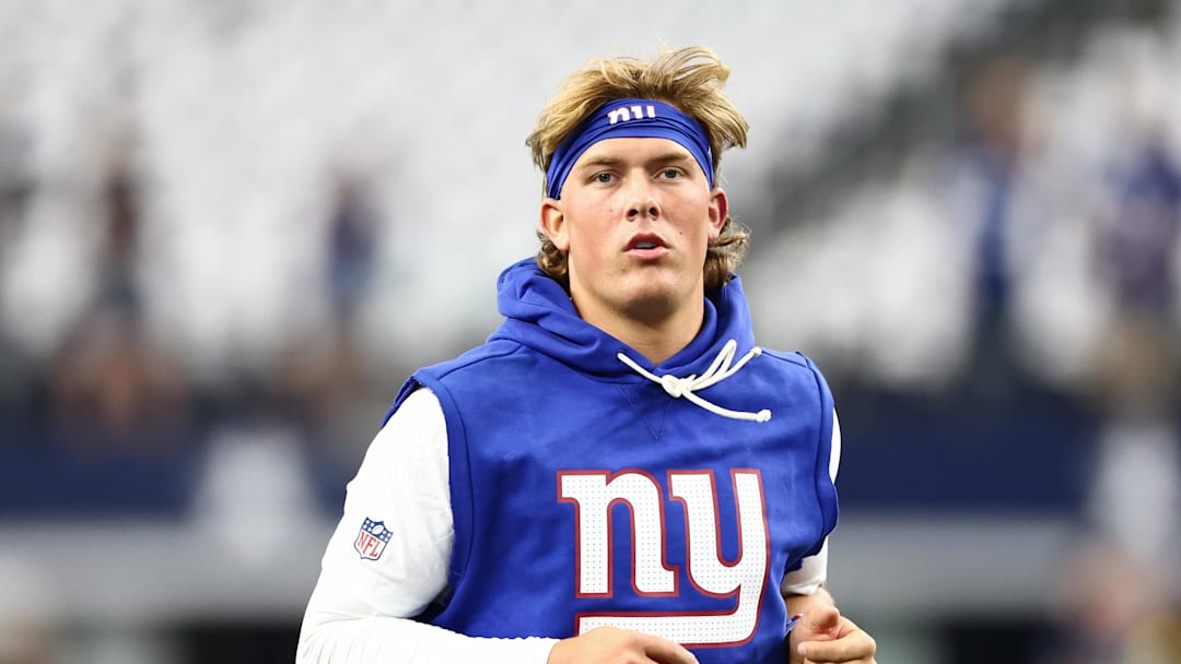 Sep 14, 2025; Arlington, Texas, USA; New York Giants quarterback Jaxson Dart (6) warms up before the game against the Dallas Cowboys at AT&T Stadium. Mandatory Credit: Kevin Jairaj-Imagn Images
