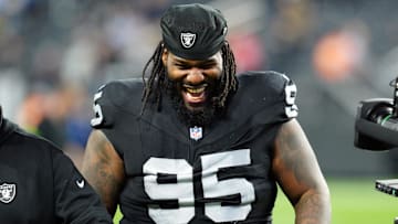 Dec 14, 2023; Paradise, Nevada, USA;  Las Vegas Raiders defensive tackle John Jenkins (95) smiles after the game against the Los Angeles Chargers at Allegiant Stadium. Mandatory Credit: Stephen R. Sylvanie-Imagn Images