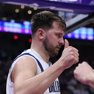 Mar 25, 2024; Salt Lake City, Utah, USA; Dallas Mavericks guard Luka Doncic (77) reacts to a call for the Utah Jazz during the third quarter at Delta Center. Mandatory Credit: Rob Gray-Imagn Images