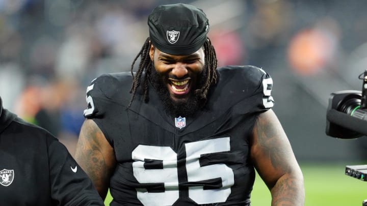 Dec 14, 2023; Paradise, Nevada, USA;  Las Vegas Raiders defensive tackle John Jenkins (95) smiles after the game against the Los Angeles Chargers at Allegiant Stadium. Mandatory Credit: Stephen R. Sylvanie-USA TODAY Sports