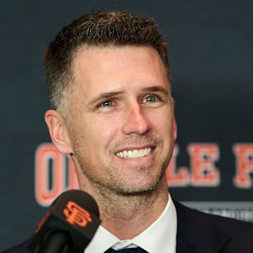Dec 12, 2024; San Francisco, CA, USA; San Francisco Giants president of baseball operations Buster Posey speaks during the introductory press conference for shortstop Willy Adames (not pictured) at Oracle Park.  