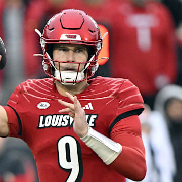 Nov 23, 2024; Louisville, Kentucky, USA;  Louisville Cardinals quarterback Tyler Shough (9) throws against the Pittsburgh Panthers during the first quarter at L&N Federal Credit Union Stadium. Mandatory Credit: Jamie Rhodes-Imagn Images