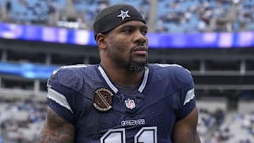 Dec 15, 2024; Charlotte, North Carolina, USA; Dallas Cowboys linebacker Micah Parsons (11) walks onto the field during the first quarter against the Carolina Panthers at Bank of America Stadium. Mandatory Credit: Jim Dedmon-Imagn Images