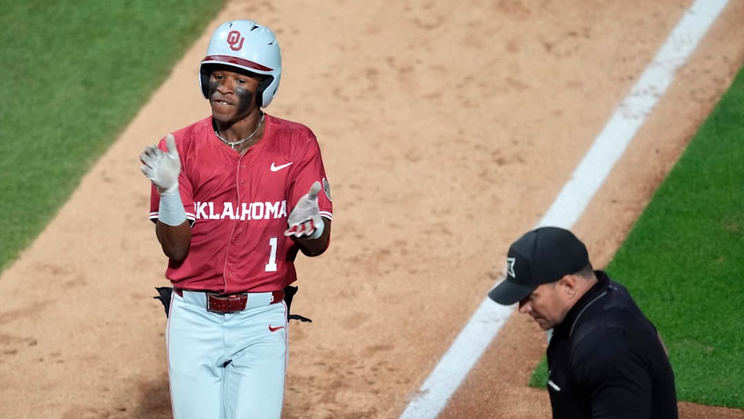 Oklahoma outfielder Jason Walk celebrates his grand slam at Oklahoma State on Tuesday night.