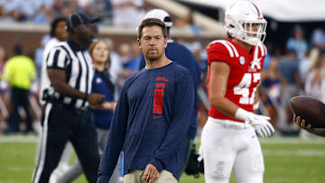 Sep 21, 2024; Oxford, Mississippi, USA; Mississippi Rebels offensive coordinator Charlie Weis Jr. watches during warm ups prior to the game against the Georgia Southern Eagles at Vaught-Hemingway Stadium. Mandatory Credit: Petre Thomas-Imagn Images