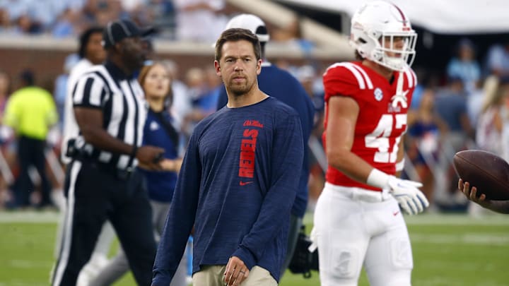 Sep 21, 2024; Oxford, Mississippi, USA; Mississippi Rebels offensive coordinator Charlie Weis Jr. watches during warm ups prior to the game against the Georgia Southern Eagles at Vaught-Hemingway Stadium. Mandatory Credit: Petre Thomas-Imagn Images