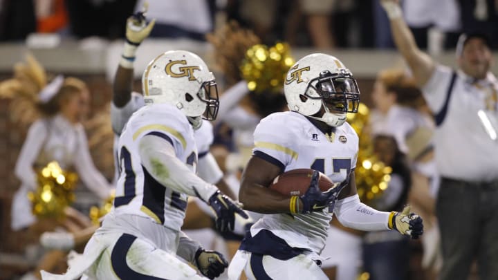 Oct 24, 2015; Atlanta, GA, USA; Georgia Tech Yellow Jackets defensive back Lance Austin (17) returns a blocked kick for a game winning touchdown against the Florida State Seminoles in the fourth quarter at Bobby Dodd Stadium. Georgia Tech defeated Florida State 22-16. Mandatory Credit: Brett Davis-USA TODAY Sports