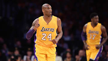 Apr 13, 2016; Los Angeles, CA, USA; Los Angeles Lakers forward Kobe Bryant (24) reacts against the Utah Jazz in the first quarter at Staples Center. Bryant concludes his 20-year NBA career tonight. Mandatory Credit: Robert Hanashiro-Imagn Images