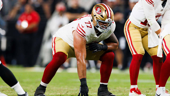 San Francisco 49ers right guard Dominick Puni (77)