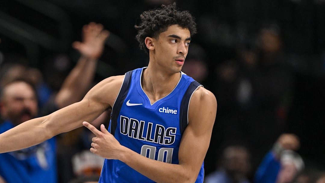 Feb 10, 2025; Dallas, Texas, USA; Dallas Mavericks guard Max Christie (00) celebrates making a three point basket during overtime against the Sacramento Kings at the American Airlines Center. Mandatory Credit: Jerome Miron-Imagn Images