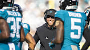 Nov 16, 2025; Jacksonville, Florida, USA; Jacksonville Jaguars head coach Liam Coen reacts following a touchdown against the Los Angeles Chargers during the third quarter at EverBank Stadium. Mandatory Credit: Morgan Tencza-Imagn Images