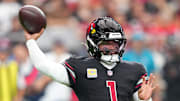 Oct 5, 2025; Glendale, Arizona, USA; Arizona Cardinals quarterback Kyler Murray (1) makes a throw against the Tennessee Titans during the fourth quarter at State Farm Stadium. Mandatory Credit: Joe Camporeale-Imagn Images