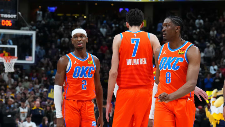 Dec 16, 2023; Denver, Colorado, USA; Oklahoma City Thunder guard Shai Gilgeous-Alexander (2) and forward Chet Holmgren (7) and forward Jalen Williams (8) and forward Jaylin Williams (6) break huddle in the fourth quarter against the Denver Nuggets at Ball Arena. Mandatory Credit: Ron Chenoy-USA TODAY Sports