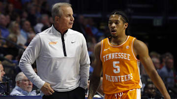 Dec 28, 2022; Oxford, Mississippi, USA;  Tennessee Volunteers head coach Rick Barnes (left) talks with Tennessee Volunteers guard Zakai Zeigler (5) as he checks out of the game during the first half against the Mississippi Rebels at The Sandy and John Black Pavilion at Ole Miss. Mandatory Credit: Petre Thomas-Imagn Images