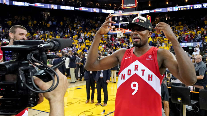 Jun 13, 2019; Oakland, CA, USA; Toronto Raptors center Serge Ibaka (9) celebrates after beating the Golden State Warriors in game six of the 2019 NBA Finals to win the NBA Championship at Oracle Arena. Mandatory Credit: Kyle Terada-USA TODAY Sports