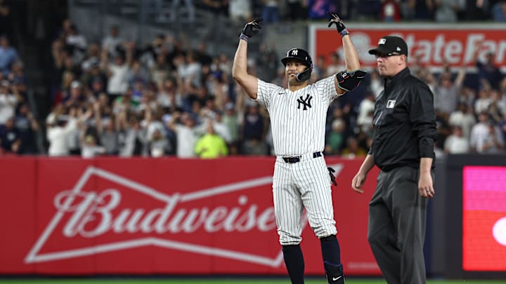 Stanton celebrates a double against the Orioles. Stanton celebrates a double against the Orioles.