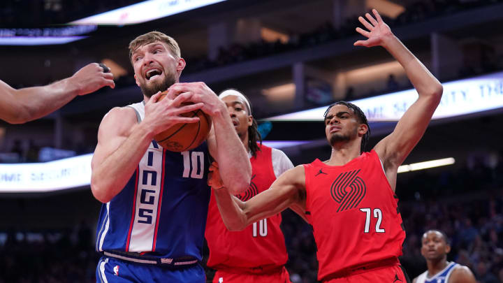 Apr 14, 2024; Sacramento, California, USA; Sacramento Kings forward Domantas Sabonis plays against the Portland Trail Blazers.