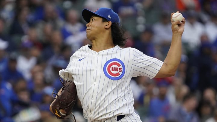 Aug 6, 2024; Chicago, Illinois, USA; Chicago Cubs pitcher Shota Imanaga (18) throws the ball against the Minnesota Twins during the first inning at Wrigley Field. 