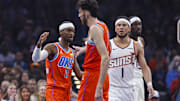 Nov 28, 2025; Oklahoma City, Oklahoma, USA; Oklahoma City Thunder guard Shai Gilgeous-Alexander (2) and center Chet Holmgren (7) high five after a play against the Phoenix Suns during the first quarter at Paycom Center. Mandatory Credit: Alonzo Adams-Imagn Images