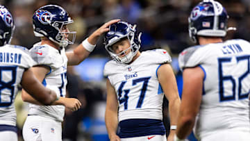 Aug 25, 2024; New Orleans, Louisiana, USA;  Tennessee Titans punter Ty Zentner (17) pats the helmet of place kicker Brayden Narveson (47) after he made a field goal against the New Orleans Saints during the second half at Caesars Superdome.