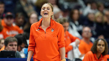 Mar 22, 2025; Storrs, Connecticut, USA; Oklahoma State Cowgirls head coach Jacie Hoyt watches from the sideline as they take on the South Dakota State Jackrabbits at Harry A. Gampel Pavilion. Mandatory Credit: David Butler II-Imagn Images