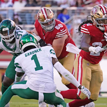 Sep 9, 2024; Santa Clara, California, USA; San Francisco 49ers running back Jordan Mason (24) runs during the second quarter against the New York Jets at Levi's Stadium. Mandatory Credit: David Gonzales-Imagn Images