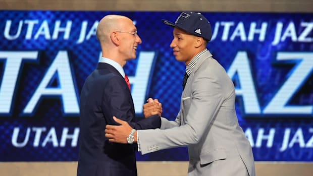 Dante Exum (Australia) shakes the hand of the NBA Commissioner Adam Silver