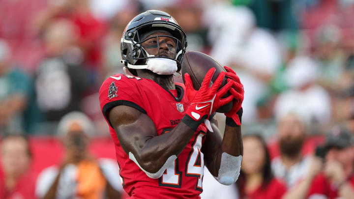 Sep 25, 2023; Tampa, Florida, USA;  Tampa Bay Buccaneers wide receiver Chris Godwin (14) warms up before a game against the Philadelphia Eagles at Raymond James Stadium. Mandatory Credit: Nathan Ray Seebeck-USA TODAY Sports