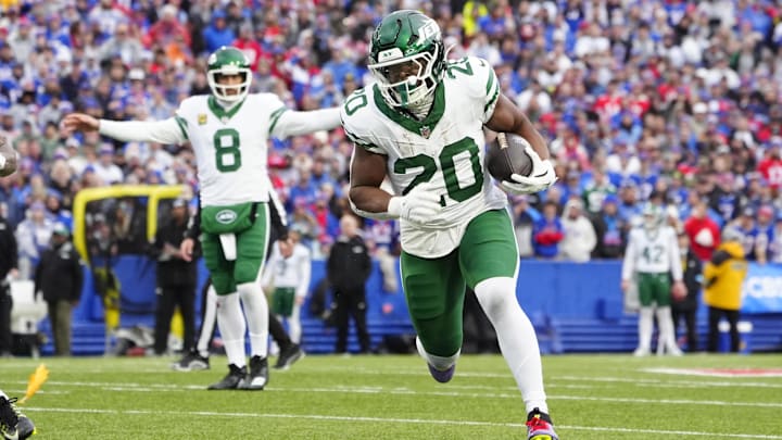 New York Jets running back Breece Hall runs with the ball against the Buffalo Bills during the first half New York Jets running back Breece Hall runs with the ball against the Buffalo Bills during the first half