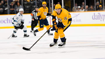 Nov 9, 2024; Nashville, Tennessee, USA;  Nashville Predators defenseman Brady Skjei (76) skates with the puck against against the Utah Hockey Club during the third period at Bridgestone Arena. Mandatory Credit: Steve Roberts-Imagn Images