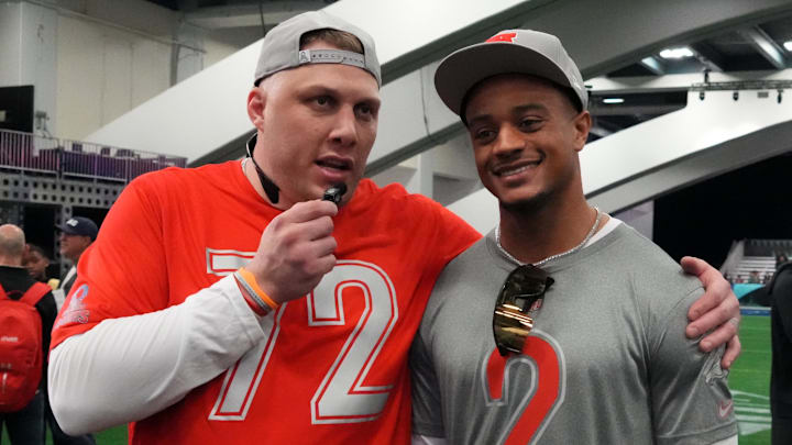 Feb 1, 2026; San Francisco, CA, USA; Denver Broncos tackle Garrett Bolles (72) interviews Broncos cornerback Patrick Surtain II (2) during AFC practice  at the Flag Fieldhouse Moscone Center South Building. Mandatory Credit: Kirby Lee-Imagn Images