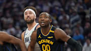 Nov 12, 2024; San Francisco, California, USA; Golden State Warriors forward Jonathan Kuminga (00) and forward Andrew Wiggins (22) battle for position with Dallas Mavericks guard Klay Thompson (31) in the second quarter at the Chase Center. Mandatory Credit: Cary Edmondson-Imagn Images