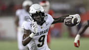 Sep 12, 2025; Houston, Texas, USA; Colorado Buffaloes wide receiver Sincere Brown (9) runs with the ball during the fourth quarter against the Houston Cougars at TDECU Stadium. Mandatory Credit: Troy Taormina-Imagn Images