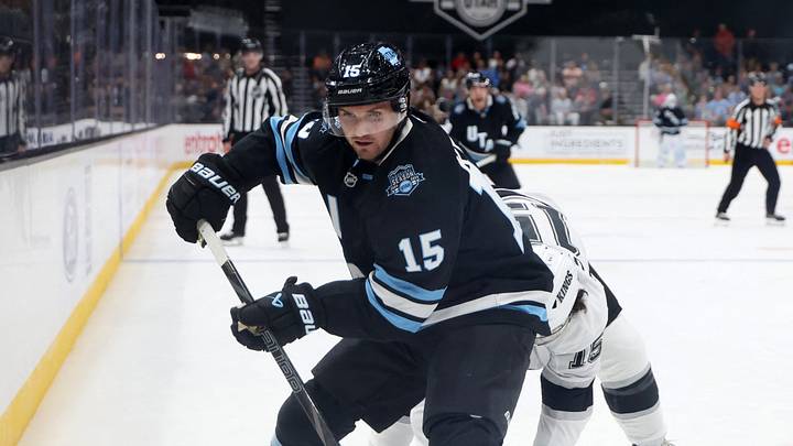 Sep 23, 2024; Salt Lake City, Utah, USA; Utah Hockey Club forward Alex Kerfoot (15) controls the puck against the Los Angeles Kings during the first period at Delta Center. Mandatory Credit: Rob Gray-Imagn Images