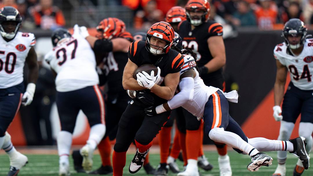 Chicago Bears linebacker Tremaine Edmunds (49) tackles Cincinnati Bengals tight end Tanner Hudson (87) as he makes a catch in the fourth quarter of the NFL football game between Chicago Bears and Cincinnati Bengals at Paycor Stadium in Cincinnati on Nov. 2, 2025. Chicago Bears linebacker Tremaine Edmunds (49) tackles Cincinnati Bengals tight end Tanner Hudson (87) as he makes a catch in the fourth quarter of the NFL football game between Chicago Bears and Cincinnati Bengals at Paycor Stadium in Cincinnati on Nov. 2, 2025.