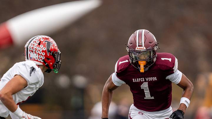 Harper Woods wide receiver Dakota Guerrant (1) runs a route during a Division 4 regional final against Divine Child High School at John Glenn High School in Westland on Saturday, Nov. 15, 2025.